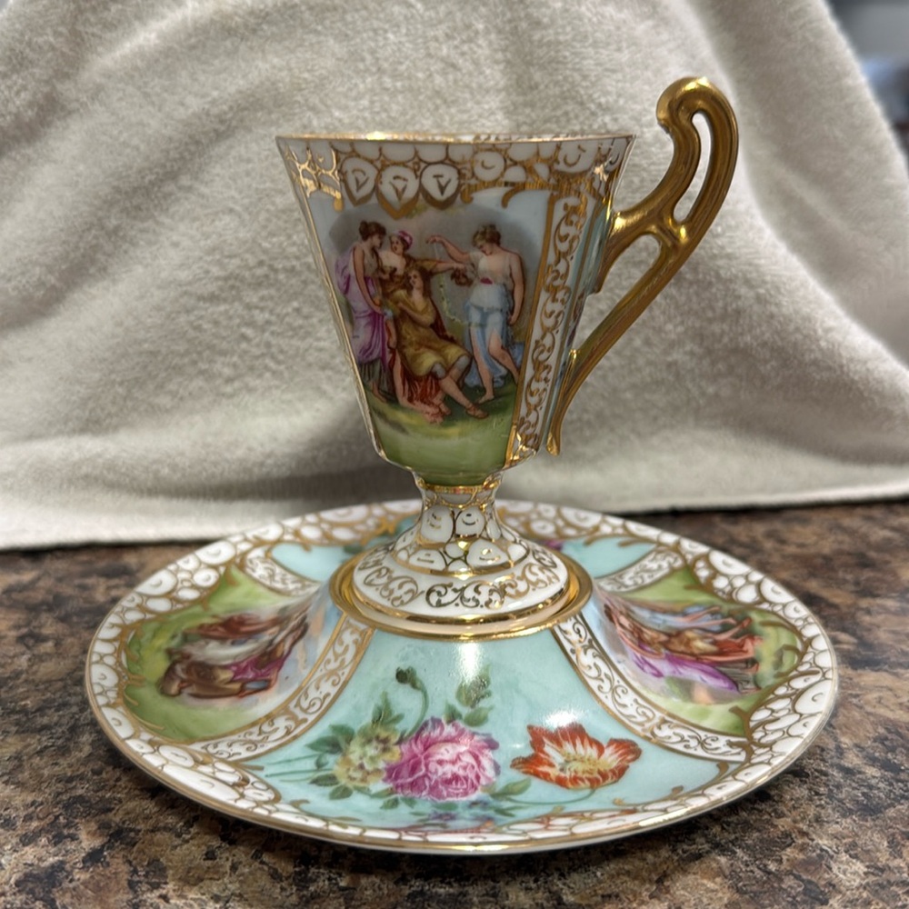 Vintage Austrian Hand- painted teacup & saucer. Fine China.